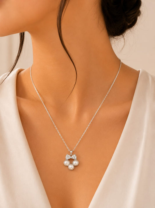 Elegant Pearl Bow Pendant Necklace